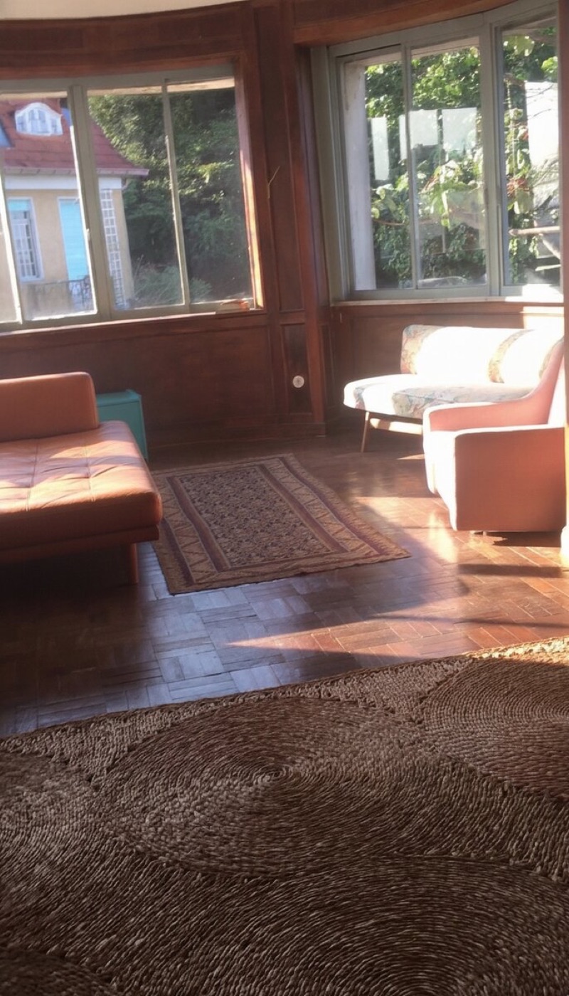Same wide view with the bench replaced by an upholstered daybed