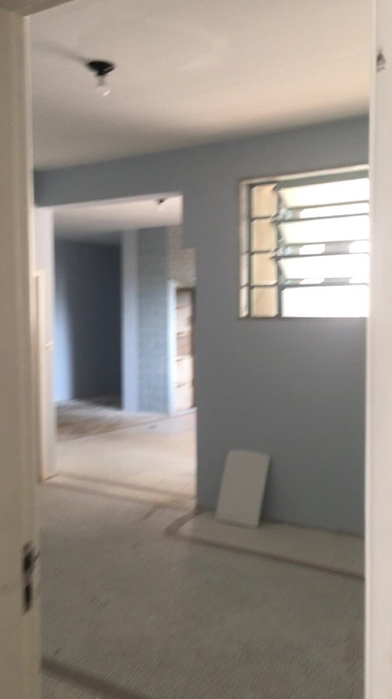 Wide view of the hall with frosted glass-block window