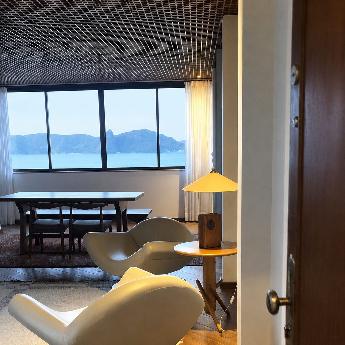 Entry view of the living room with sculptural swivel chairs