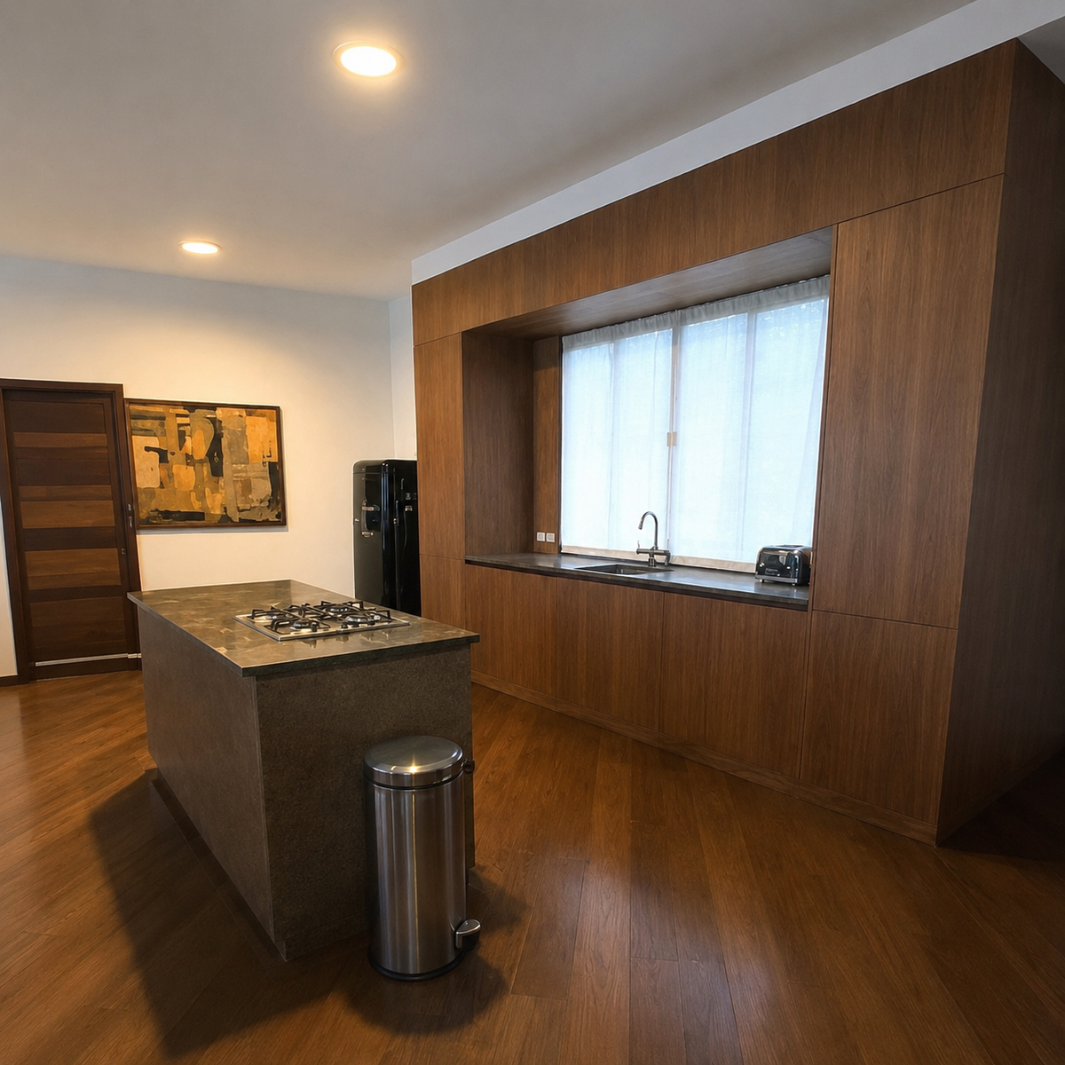 Walnut kitchen cabinetry, cooktop island, and window