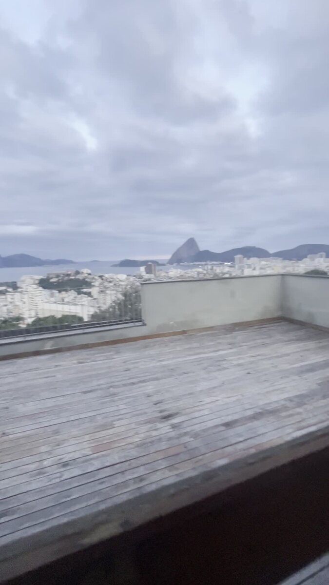 Rooftop terrace deck with view toward Sugarloaf Mountain