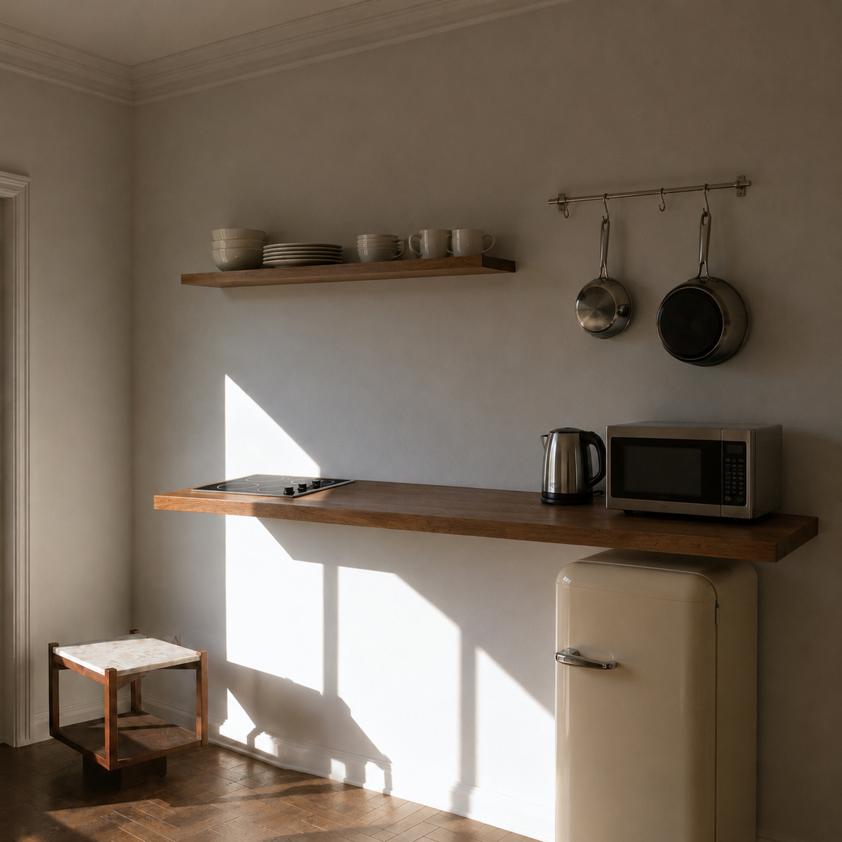 AI visualization of the same wall with a compact kitchen shelf, cooktop, microwave, hanging pots, and a vintage-style mini-fridge added