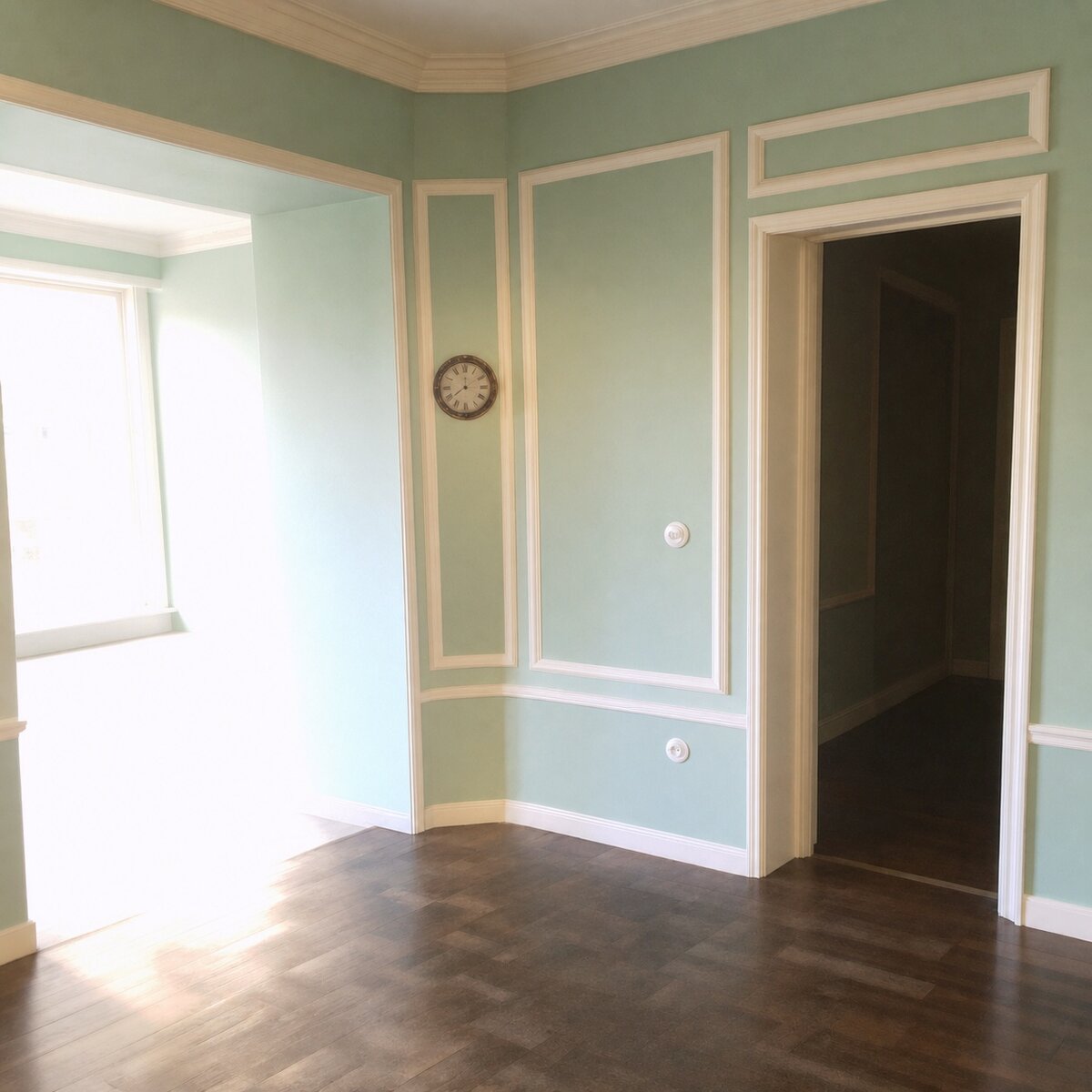 Wainscoted mint-green entrance hall, wall clock, no furniture