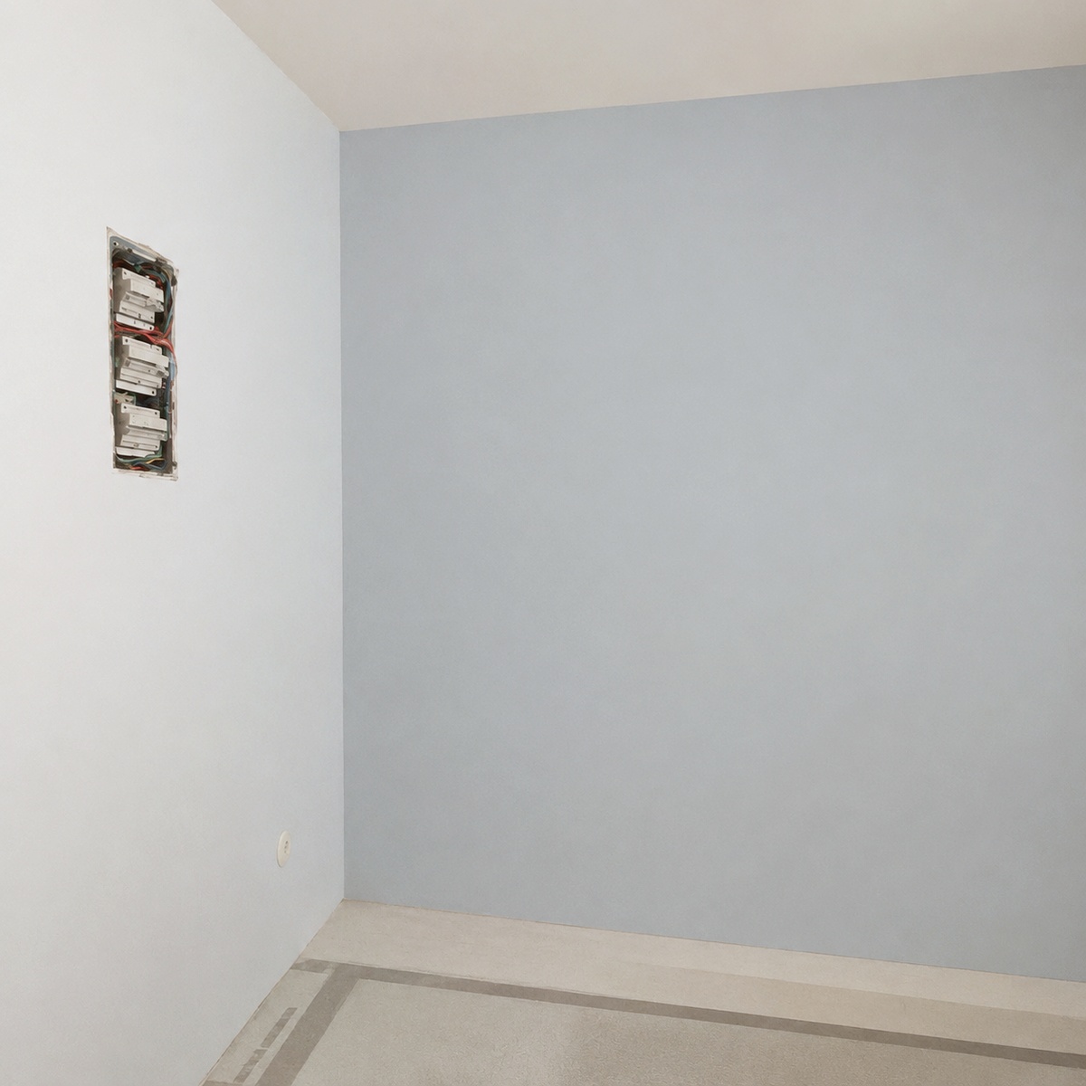 Bare bedroom corner, no furniture